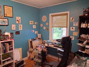 A corner of a messy art studio.