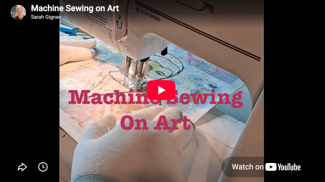Screenshot of video - using a sewing machine on a painting