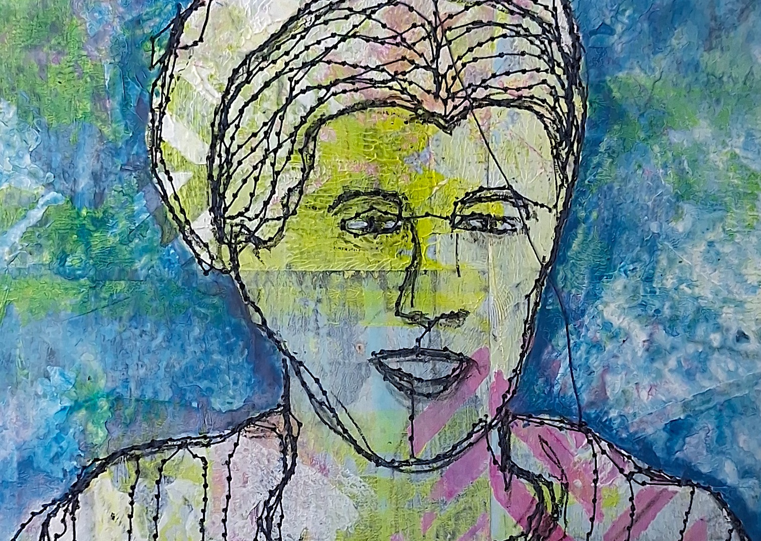 A mixed media piece of a man's face.